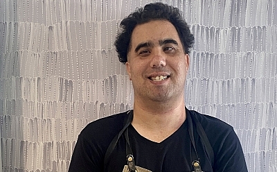 Aaron in his work apron